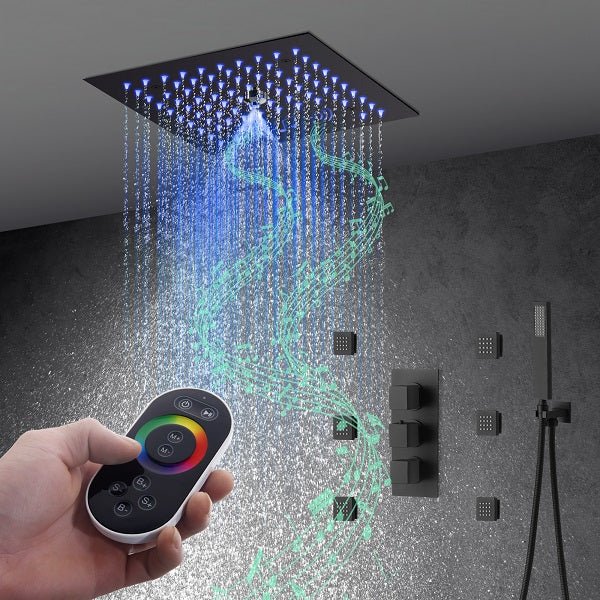 Matte black thermostatic shower valve with three control knobs and flush mount design