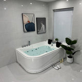 Modern bathroom with a Jacuzzi bathtub, gray tiles, and abstract art on the wall.