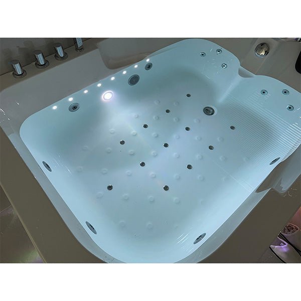 Polished chrome waterfall faucet set included with Cascada Amalfi bathtub