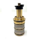 Close-up of golden Cascada C-Type thermostatic cartridge — part number CSCAFX042YS