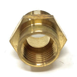 Brass hexagonal nut on a white background