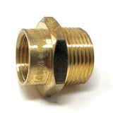 Brass plumbing fitting on a white background