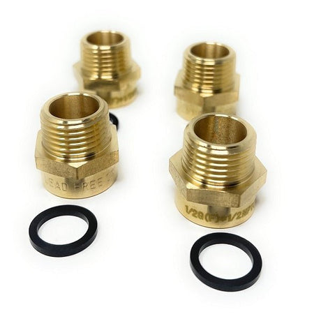 Four brass plumbing fittings with two black washers on a white background