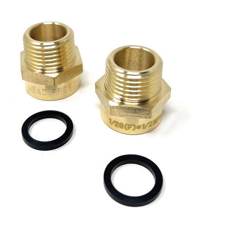Two brass plumbing fittings and two washers on a white background