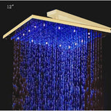 Water flowing from LED square rain shower head during use