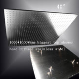 Large ceiling mounted shower head rainfall water pattern